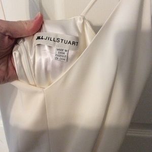 BHLDN ivory jump suit with tie around waist